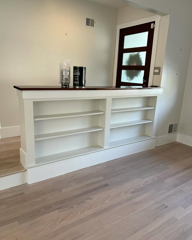 Custom built-in shelving with painted trim